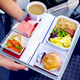 Illustration for article titled Learn more about airplane food, and you just might come to embrace it